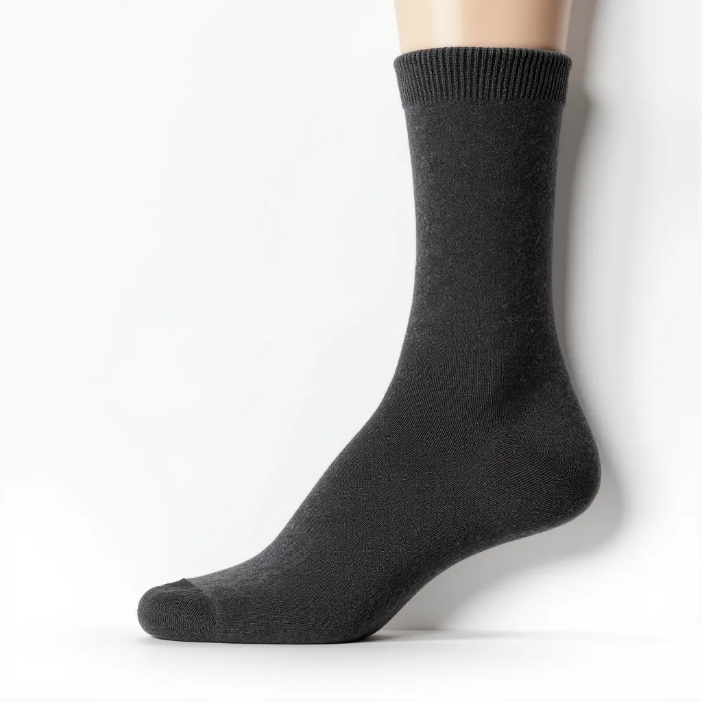Charcoal gray wool blend cycling sock showing merino wool content and reinforced heel and toe construction